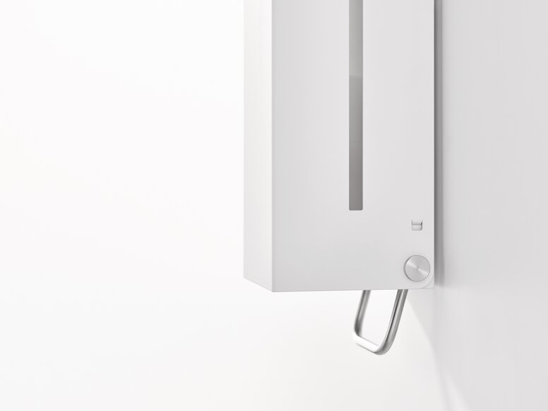 Manual soap dispenser with angular design in matt white stainless steel